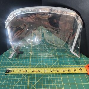 NWOT - Tahari Large Clear Silver Trim Cosmetic Bag